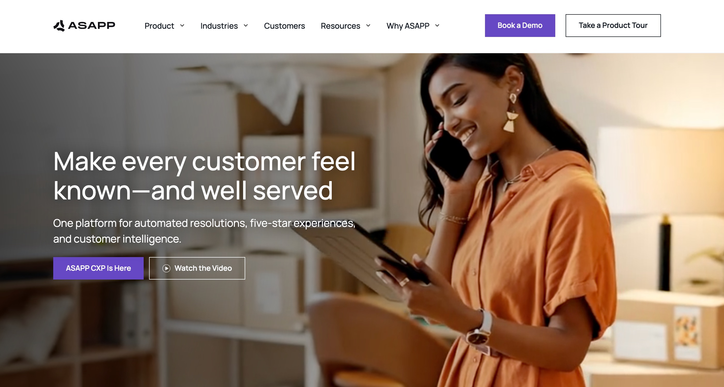 ASAPP home page headlined Make every customer feel known and well served, over a photo of a person on a phone call holding a clipboard